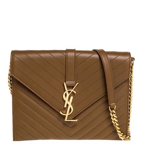 tan ysl clutch|saint laurent clutch.